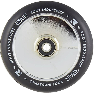 A close-up of the Root Industries AIR Hollowcore 110mm Stunt Scooter Wheel from Root Industries shows off its striking mirror chrome silver core. The wheel's black tire is adorned with white branding text along the edge, and a central bearing facilitates easy attachment.