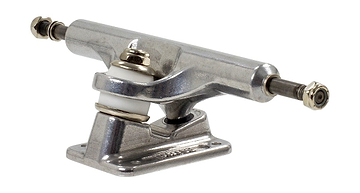 A detailed view of a Mindless Gen X Raw Longboard Truck, featuring a gleaming silver finish. Perfect for wider decks, this Standard King Pin truck highlights a visible kingpin, bushings, and extending axles secured with nuts on each side. The baseplate prominently displays the Mindless brand name beneath it.