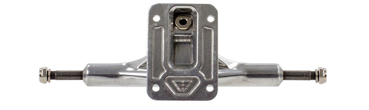Close-up image of the Mindless Gen X Raw Longboard Truck in silver, ideal for wider decks, highlighting its baseplate and axles. The 149mm truck showcases a symmetrical design with visible mounting holes and a central pivot point against a white background.