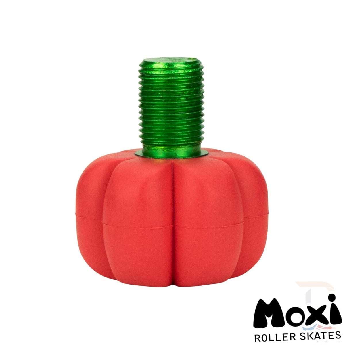 Displayed on a white background is the Moxi Brake Petal Roller Skate Toe Stop in Red Hibiscus, a pumpkin-shaped toe stop with a green stem. It's an ideal accessory for Moxi fans who want to add some flair to their roller skates.