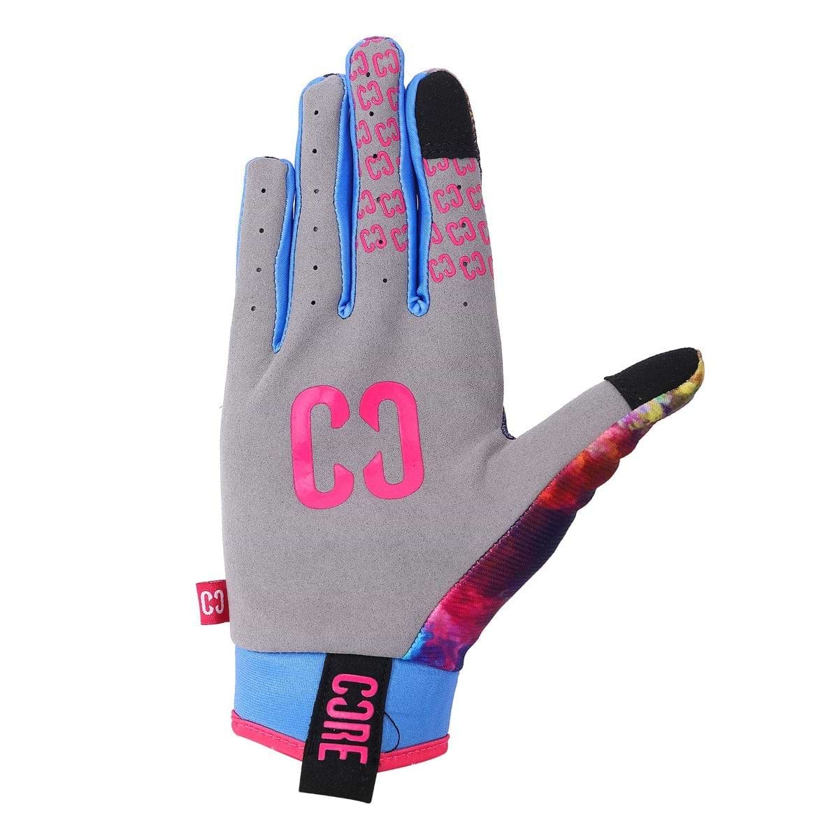 Introducing the vibrant CORE Aero Skate Protection Gloves - Neon Galaxy: a colorful glove showcasing gray, blue, and multicolored patterns. Featuring "C3" and "CORE" logos in pink, it offers a grip-enhancing design with individual finger grips on the palm side and includes a wrist strap adorned with a red logo tag. Perfect for any activity!
