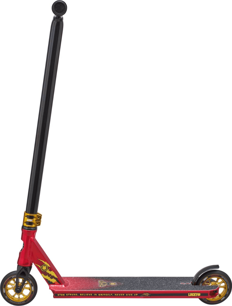 The Lucky John Marco Gaydos JMG Signature Complete Stunt Scooter showcases a bold red frame paired with a black deck and features JMG's Signature V3 wheels in eye-catching yellow. The handlebars are elegantly designed in black with a gold clamp, and the deck is embellished with inspiring text, capturing the essence of the Prospect model.