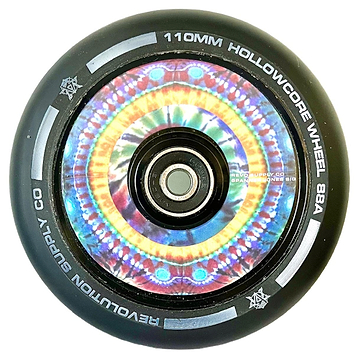 Introducing the Revolution Hollowcore 110mm Stunt Scooter Wheel - Spanner Jones Signature, featuring a vibrant kaleidoscope pattern with an 88A hardness rating. The outer edge proudly displays the Revolution branding. This colorful wheel showcases a symmetrical mandala design complemented by a black outer rim, making it perfect for enhancing your ride.