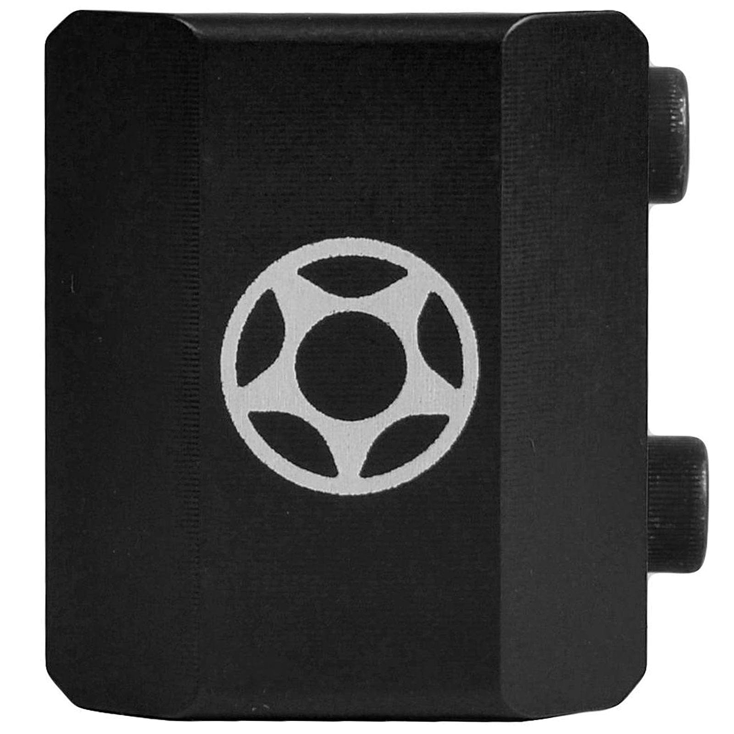 A black, box-like object featuring a white circular logo that resembles a stylized camera aperture on its surface, with two knobs extending from the right side, similar to those found on a Proto Half Knuckle 2 Bolt Oversized Stunt Scooter Clamp in black.