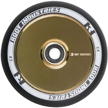 A close-up of the Root Industries AIR Hollowcore 120mm stunt scooter wheel highlights its gold metal core, black tire, and white detailing. The wheel showcases Root Industries' hollowcore technology with the brand name "ROOT INDUSTRIES" elegantly printed on the rim.