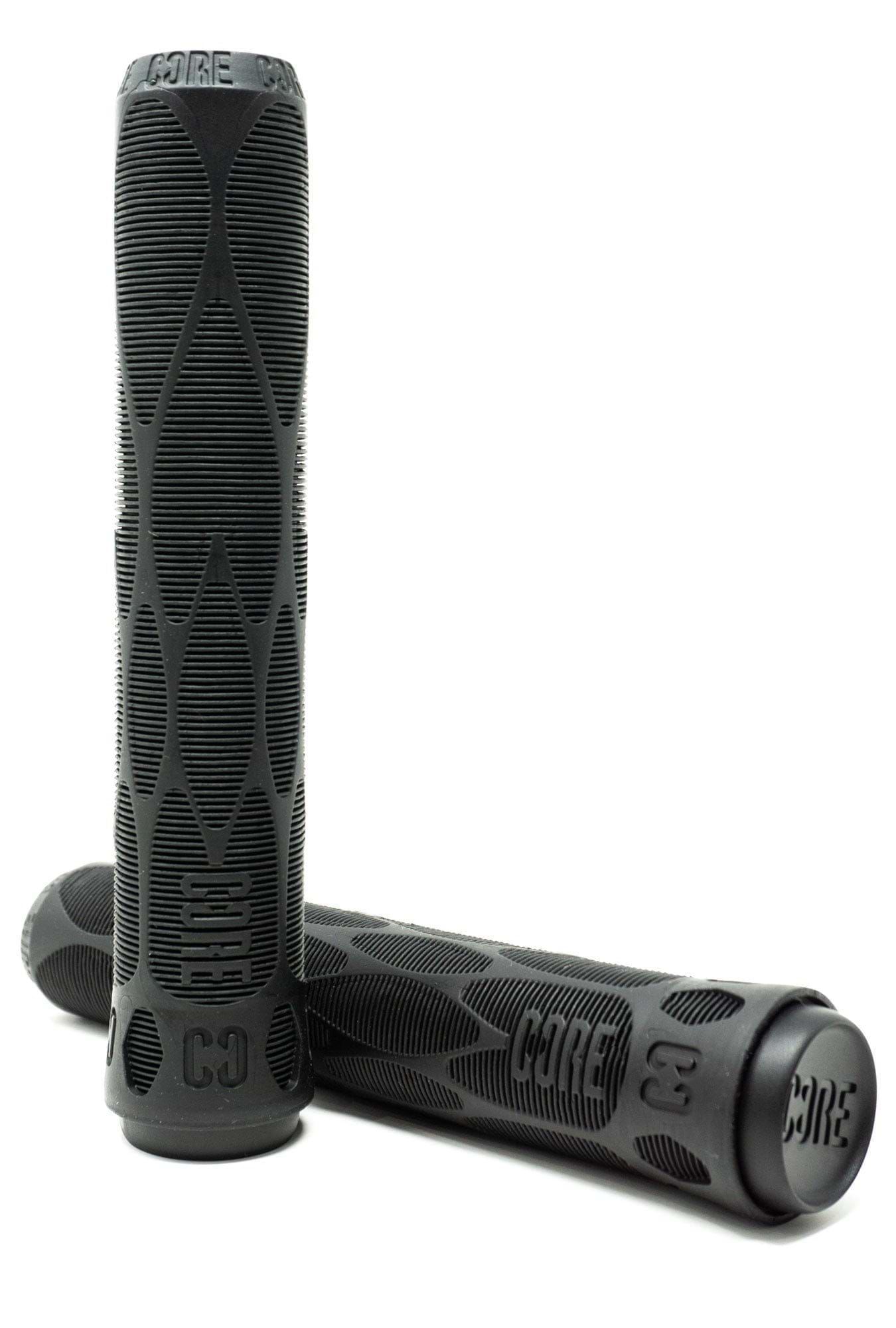 A pair of black CORE Pro Stunt Scooter Grips, each measuring 170mm, featuring a textured surface with "CORE" engraved on them. Designed with a shock-absorbing compound for superior impact protection, one grip stands upright while the other rests horizontally, making them ideal for stunt scooter enthusiasts seeking enhanced grip performance.
