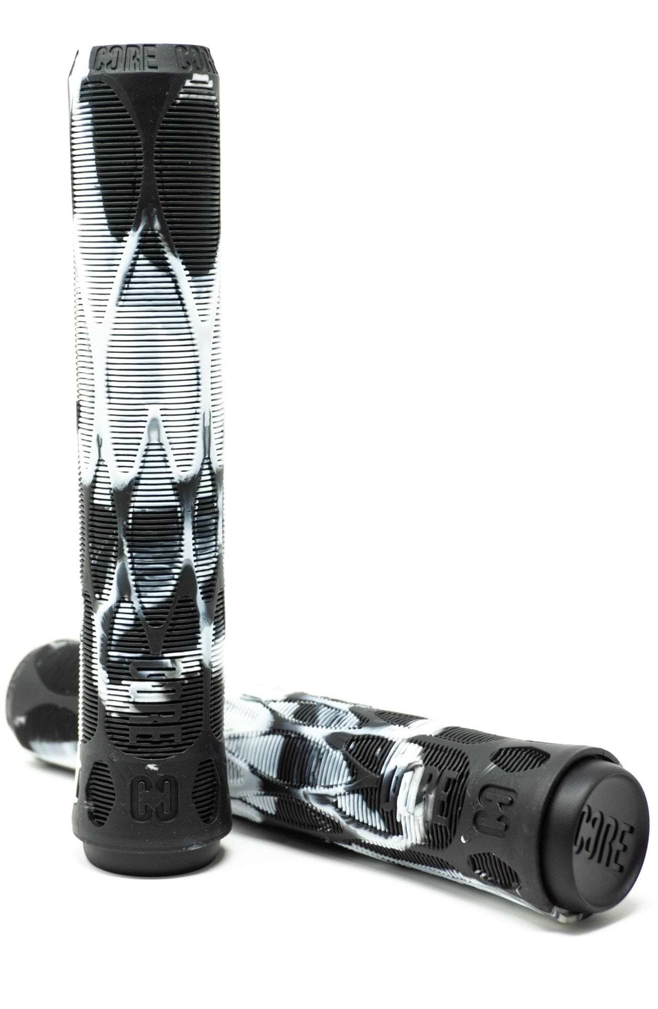 A pair of CORE Pro Slate White / Black Stunt Scooter Grips, each measuring 170mm and featuring a black and white patterned texture, stand upright. The word "CORE" is embossed on the top and sides of each grip, embodying the durability associated with high-quality stunt scooter grips.