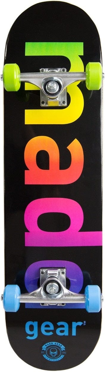 The Madd Gear MGP Pro Series Gradient Black Complete Skateboard features a durable 9-ply maple deck with colorful, rainbow-gradient letters spelling "mad," while the word "gear" stands out in blue at the bottom. It includes lime green and blue wheels attached to silver trucks, rolling seamlessly on ABEC 3 bearings.