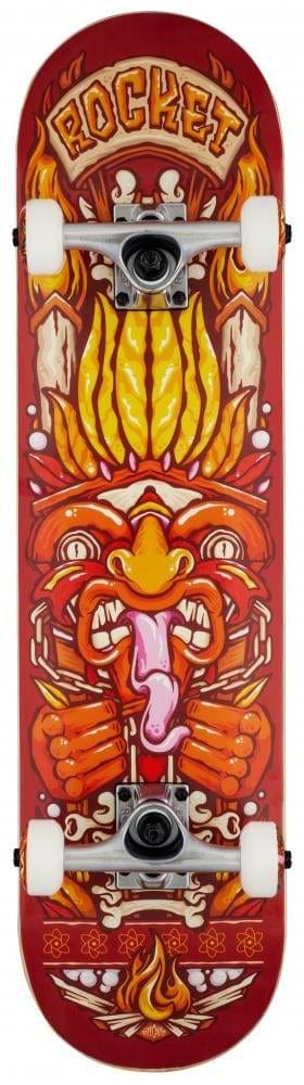 The Rocket Chief Pile-Up Red Complete Skateboard (7.75" x 31") for beginners features a bold tribal graphic, flames, and "ROCKET" in yellow. Made with 7-ply hardrock maple and durable aluminum trucks for smooth rides.
