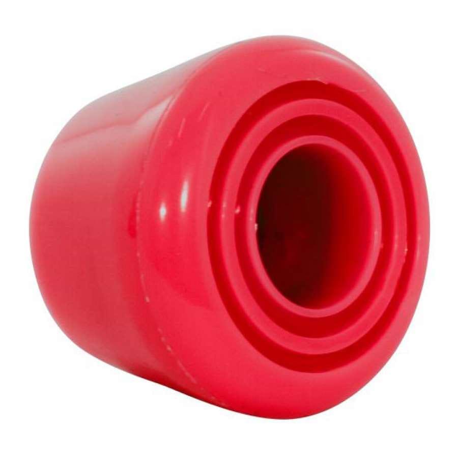A close-up view of the Rio Roller Toe Stops - Red, showcasing their cylindrical shape with an open end that resembles a stylized suction device or stopper. The smooth, shiny surface from Rio Roller reflects light, highlighting its texture and form.