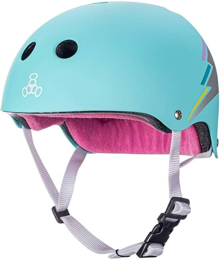 The Triple 8 Certified Sweatsaver Skate Helmet - Teal Hologram offers dual-certified protection. It features a teal shell with black ventilation holes, complemented by a soft pink interior lining. A multicolored stripe decorates the side, and a white adjustable chin strap provides an ideal fit for every adventure.