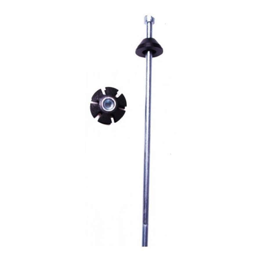 Beside a round, black gear-like object from the Dare ICS Scooter Compression Kit sits a long metal axle with a threaded end and bolted top. This gear, which features multiple teeth and a central hole, is positioned to the left of the standard forks against a white background.