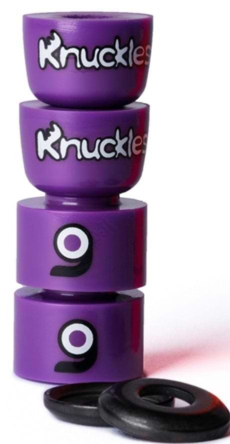 A set of four purple longboard bushings with the Orangatang "Knuckles" branding, made using a high-rebound Randy Thane formula, comes in a vibrant gumdrop shade. Two rubber washers are included alongside the bushings.