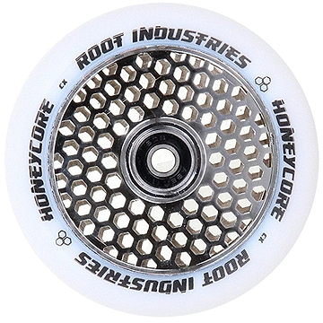 This close-up of the Root Industries Honeycore 110mm Stunt Scooter Wheel highlights its eye-catching honeycomb pattern within the mirror chrome metal core. The elegant white outer rim prominently features "Root Industries Honeycore" in bold black lettering, surrounding a precision central bearing.