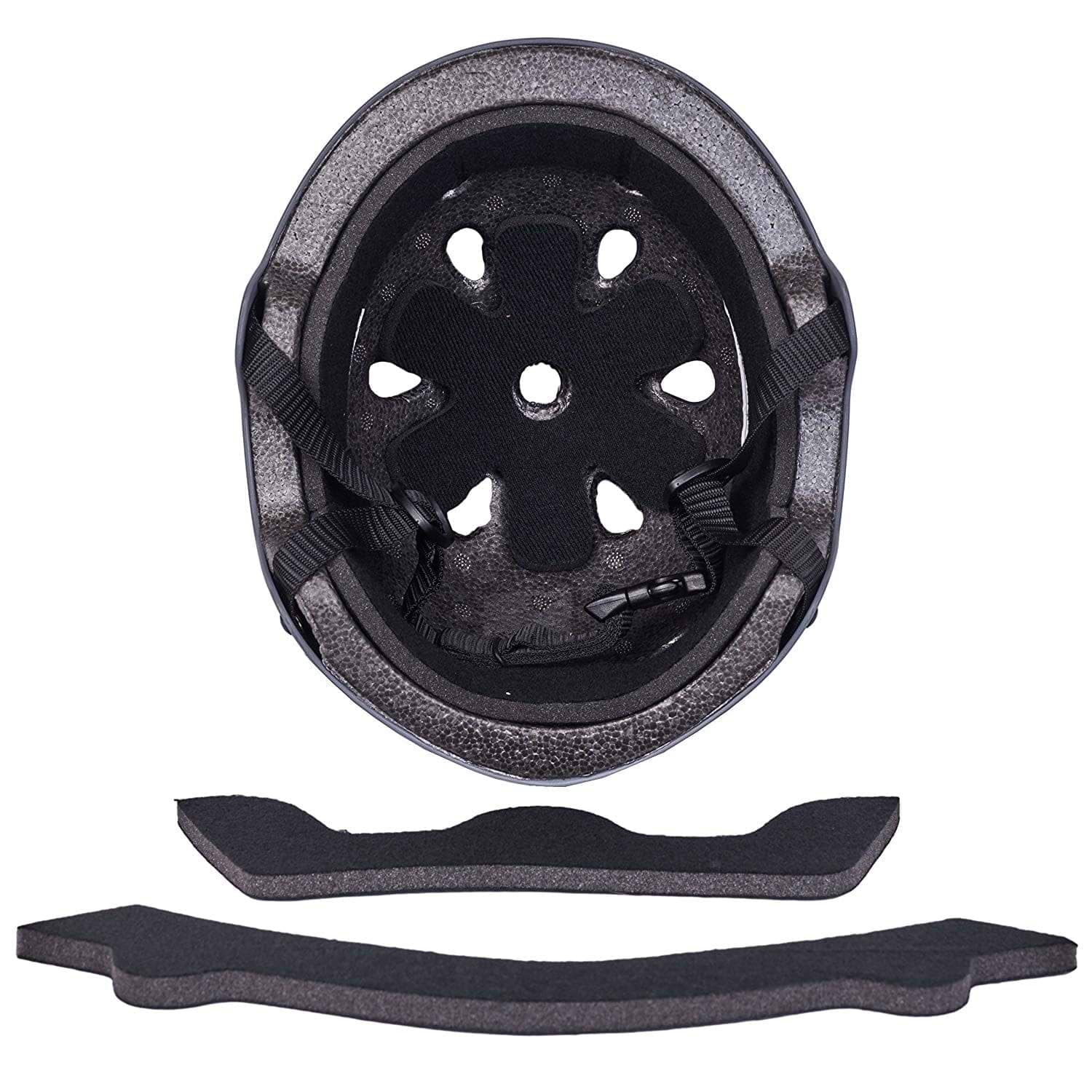 A top-down view of the CORE Action Sports Skate / Scooter Helmet - Black by CORE, showing black foam padding, ventilation holes, adjustable straps, and two removable foam inserts below this low-profile helmet.