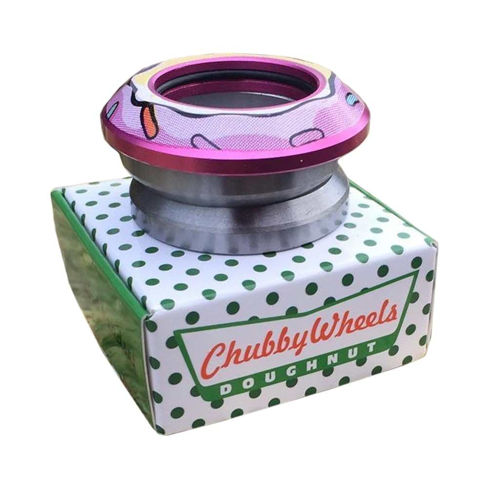 A vibrant pink Chubby Doughnut Integrated Stunt Scooter Headset, showcasing a playful doughnut theme with sprinkles, is nestled on top of a white box decorated with green polka dots. The box prominently displays the product name "Chubby Wheels Doughnut," perfectly complementing the delightful doughnut design.