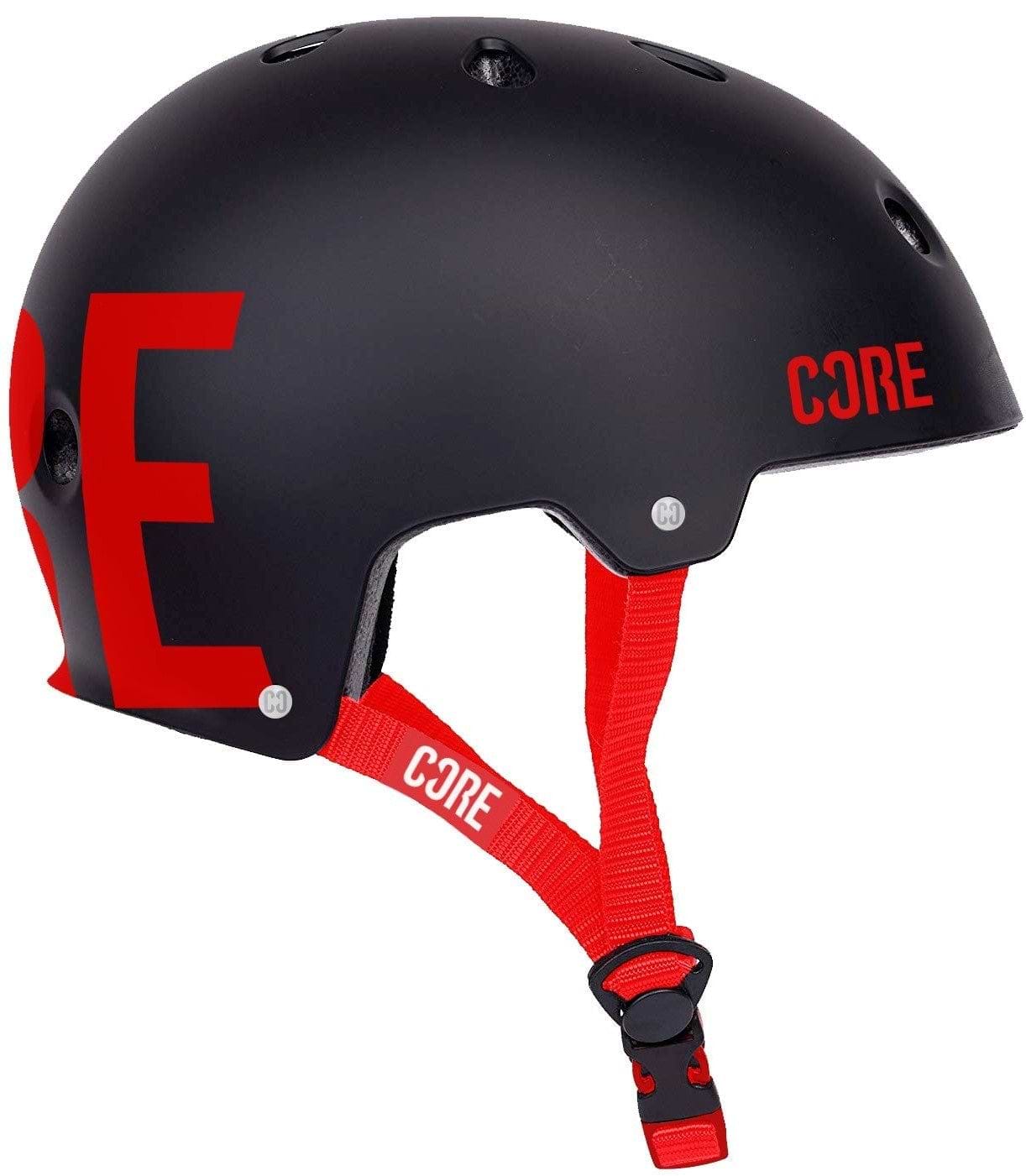 Introducing the CORE Street Skate/Scooter Helmet in Black and Red, showcasing bold "CORE" lettering on the side. This helmet features a classic skate design with ventilation holes, an adjustable red strap, CORE Lux Pads for enhanced comfort, and a quick-release buckle for effortless style.