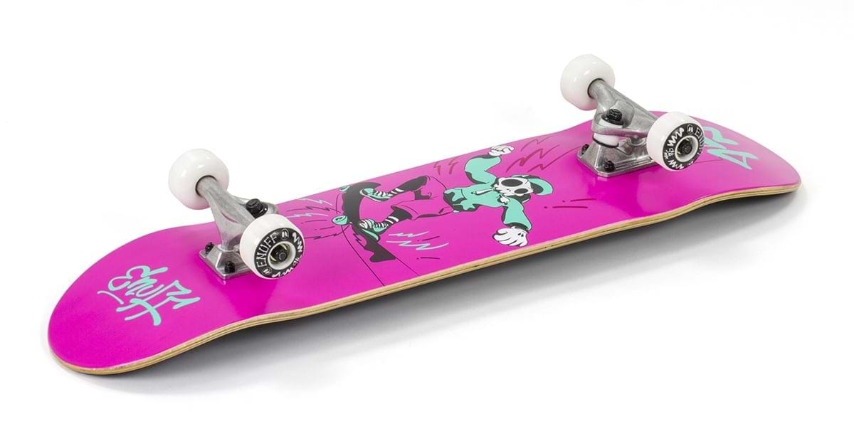 The Enuff Skully Pink Complete Skateboard - 7.75" x 31.5" from Enuff features a vibrant pink deck adorned with a striking cartoon skeleton graphic. An ideal choice for beginners, this entry-level skateboard includes premium components such as white wheels and silver trucks, beautifully contrasted against a clean white background.