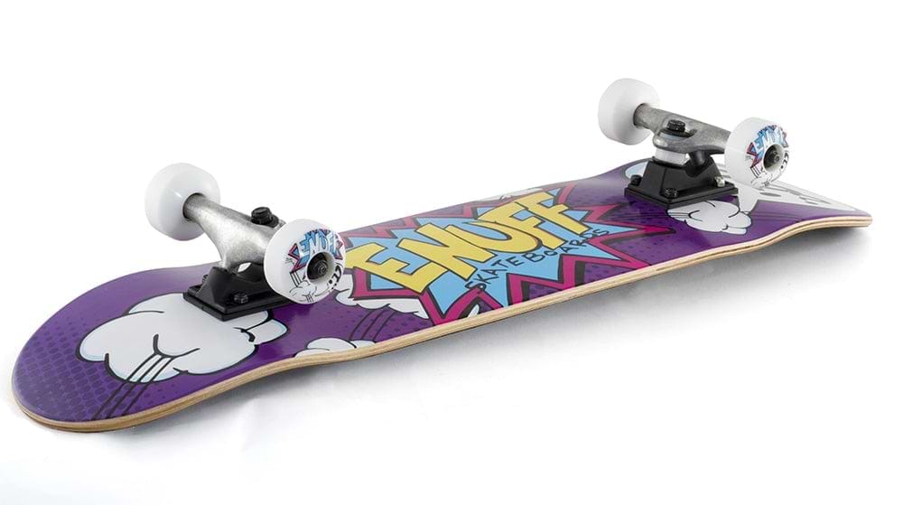 The Enuff POW Purple Mini Complete Skateboard, measuring 7.25" x 29.5", features a vibrant comic-style design with the word "ENUFF" in bold yellow letters. This beginner-friendly skateboard includes a sturdy maple deck, 54mm white wheels, silver trucks, and is decorated with cartoon cloud graphics in the background.