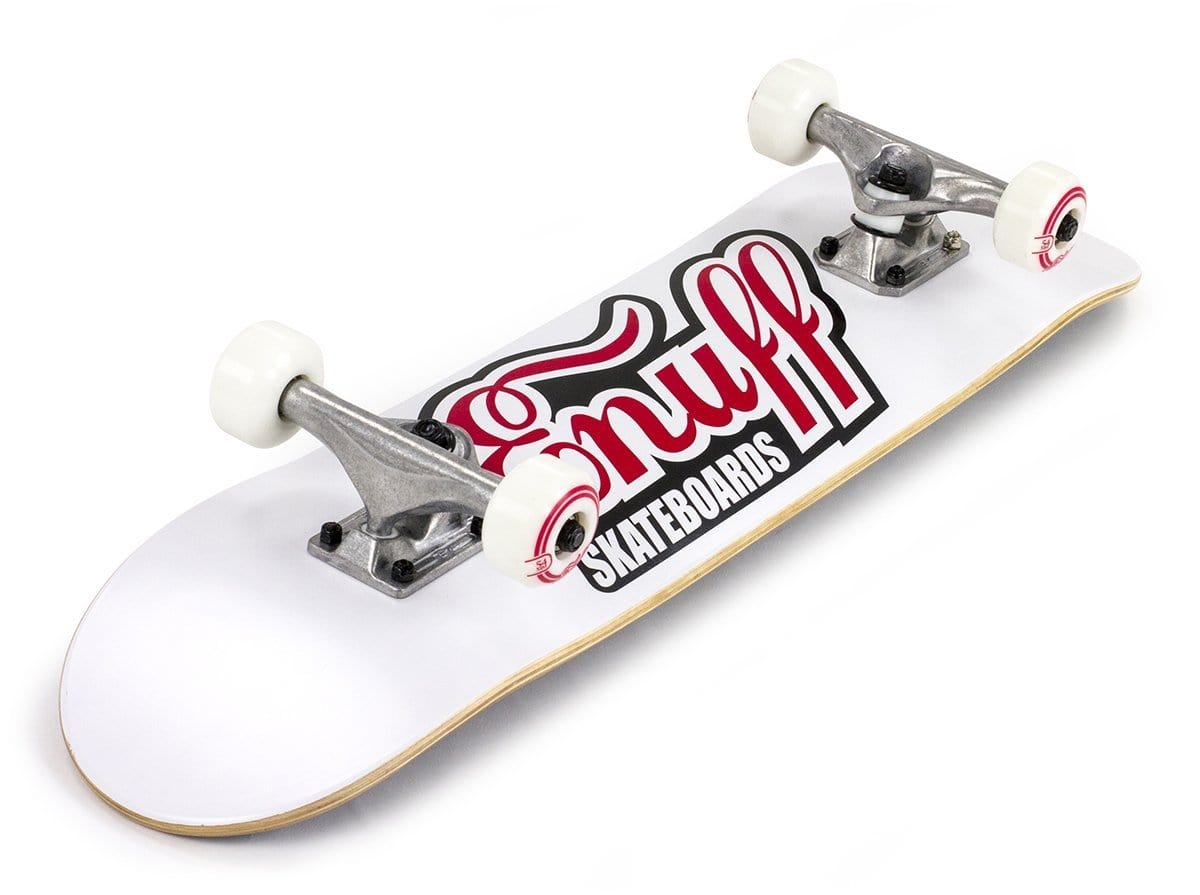 A 7.75" x 31.5" Enuff Classic Logo Complete Skateboard in white is showcased, featuring coordinated wheels and Enuff Decade trucks. The deck prominently displays striking red and black "Snuff Skateboards" text, making it an ideal entry-level choice for skateboarding enthusiasts.
