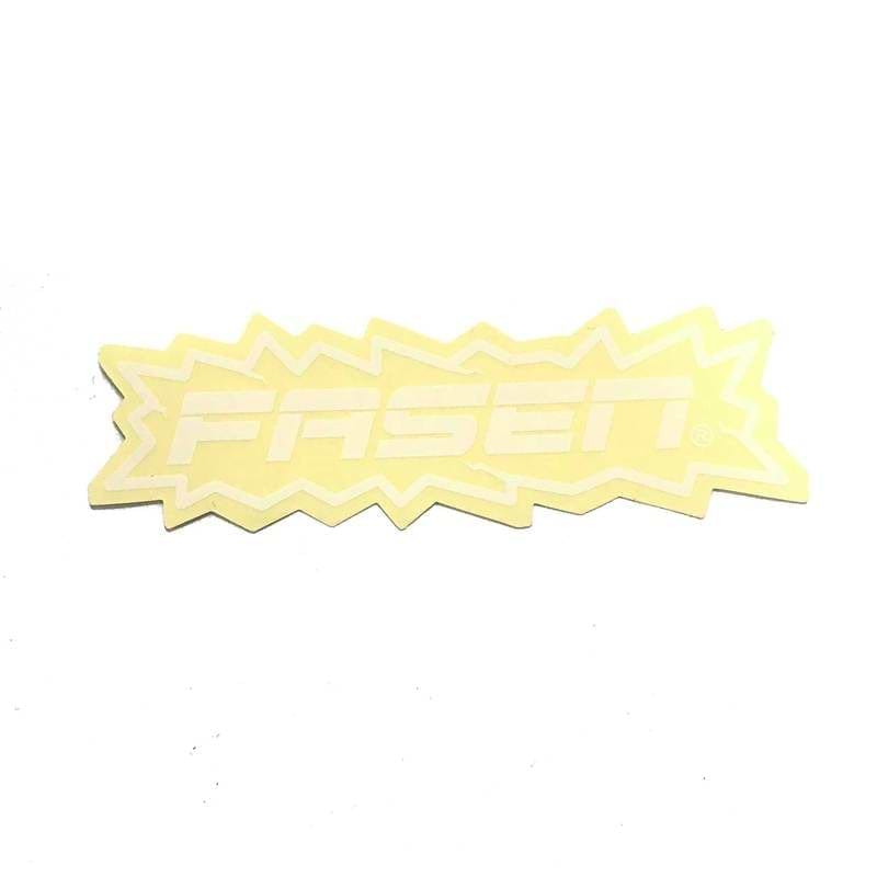 The Fasen POW Logo Sticker - Clear, featuring a bold, stylized "Fasen" text on a yellow and white background with jagged edges, is a must-have accessory for any Fasen enthusiast seeking to add some flair to their collection.