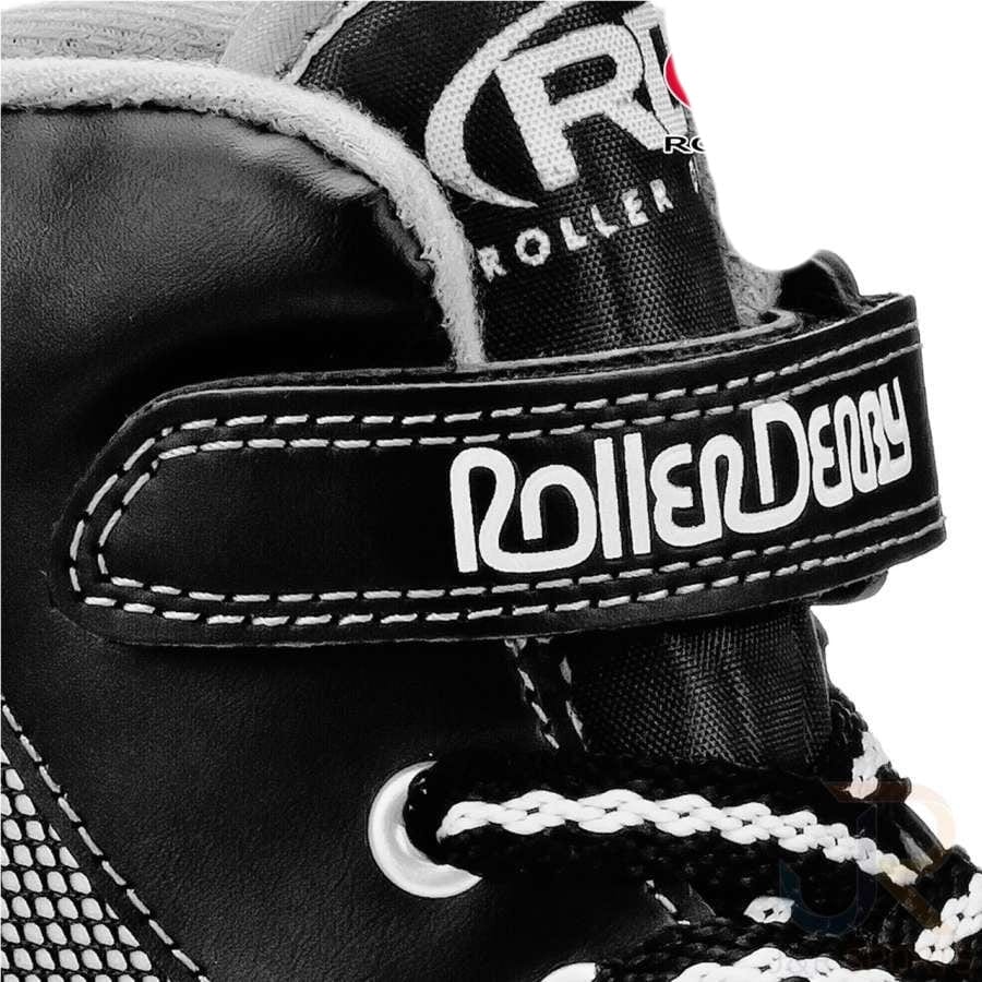 Close-up of the Roller Derby Firestar V2 quad roller skate in black and grey, featuring white laces and a Velcro strap labeled with the "Roller Derby" brand. The prominently displayed logo showcases the Roller Derby name on the side, highlighting its sporty shoe design.