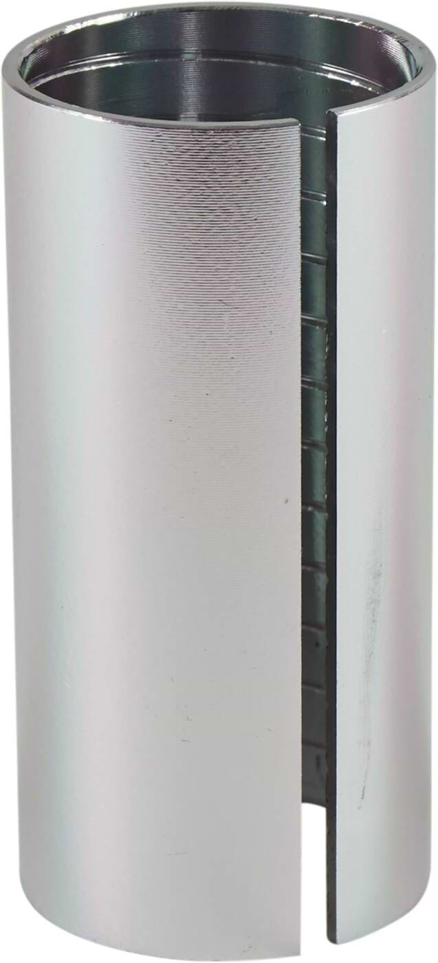 A cylindrical metal object featuring a vertical slit along its length, the Dial 911 HIC Scooter Compression Shim by Dial 911 boasts a smooth, reflective surface with a metallic finish that resembles components used in scooters or high-performance compression setups.