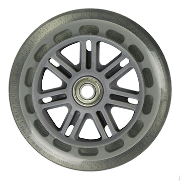 A close-up view of a single JD Bug Original Street 100mm Scooter Wheel in clear, featuring a metal bearing hub and a transparent outer rim. This wheel includes ABEC 5 bearings and is designed with angular spokes extending from the center to the edge.