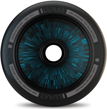 The stylish Lucky Lunar 110mm Stunt Scooter Wheel, offered in a black and blue color scheme by the renowned brand Lucky, features a circular design ideal for scooter builds. The inner rim prominently displays the words "Lunar," "One Hundred Ten Millimeters," and incorporates the advanced "Lucky Rebound Technology." Its outer edge is crafted with a sleek, modern finish.