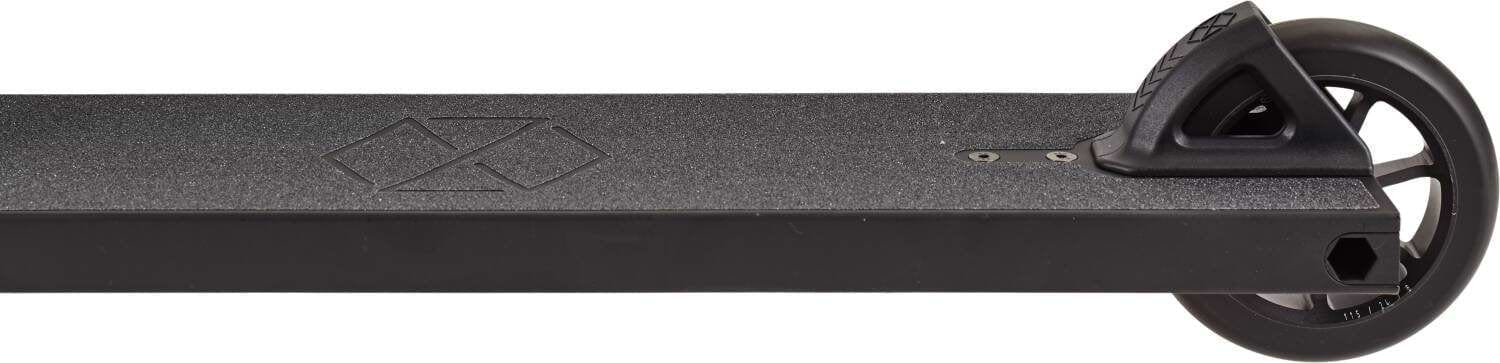 Close-up side view of the Native Stem M 520mm Complete Stunt Scooter in black, featuring a textured deck with a subtle geometric logo, plus visible back wheel and brake assembly.