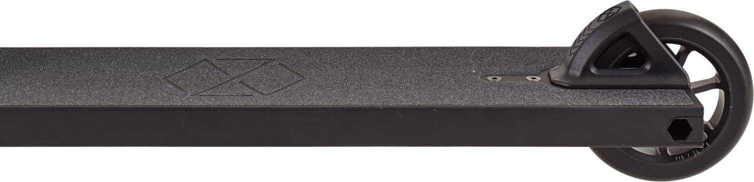 Close-up side view of the Native Stem L 560mm Complete Stunt Scooter in black, featuring a textured deck, geometric logo, and a single rear wheel with curved brake—ideal for beginners or street riders.