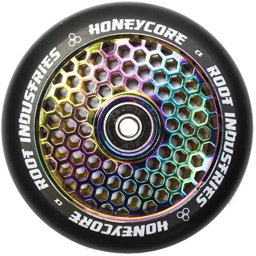 The Root Industries Honeycore 110mm Stunt Scooter Wheel in Black and Rocket Fuel Neochrome showcases a vibrant honeycomb design interior paired with a sleek black outer rim. It is equipped with premium Root Industries bearings, and the words "Root Industries" and "Honeycore" are elegantly inscribed on the rim.