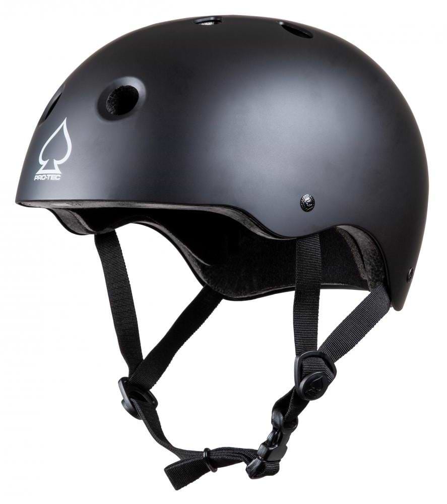 A Pro-Tec Prime Skate/Scooter Helmet in black is displayed against a white background, featuring ventilation holes and adjustable straps. Its smooth exterior and integrated EPS foam offer exceptional protection, accentuated by the iconic Pro-Tec logo.