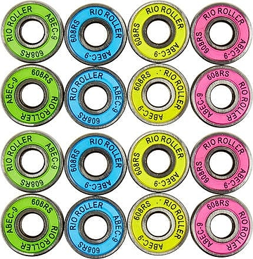 A set of sixteen vibrant roller skate bearings from Root Industries showcases multicoloured rubber shields in six green, five blue, and five pink. Each bearing is inscribed with "Rio Roller" and "ABEC 9 Precision Bearings," with "608RS" gracefully etched along the edge.