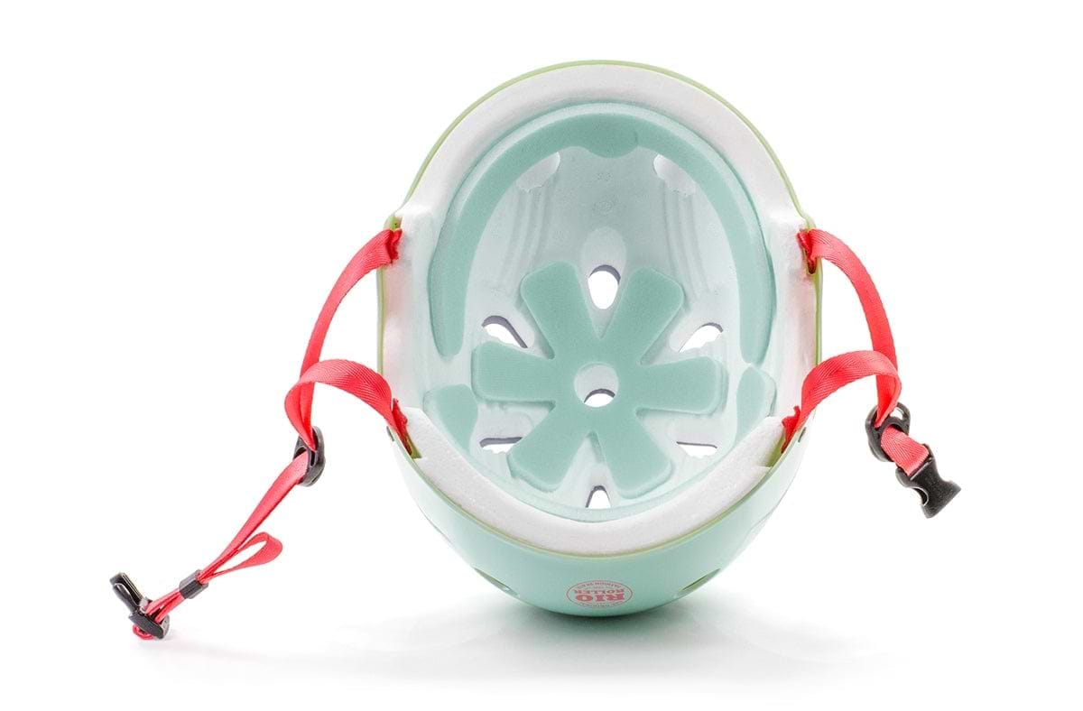 The Rio Roller Script Skate Helmet - Teal boasts a retro teal design, complemented by red adjustable straps and a sturdy high-impact ABS shell. From above, you can notice the interior padding and effective ventilation holes.
