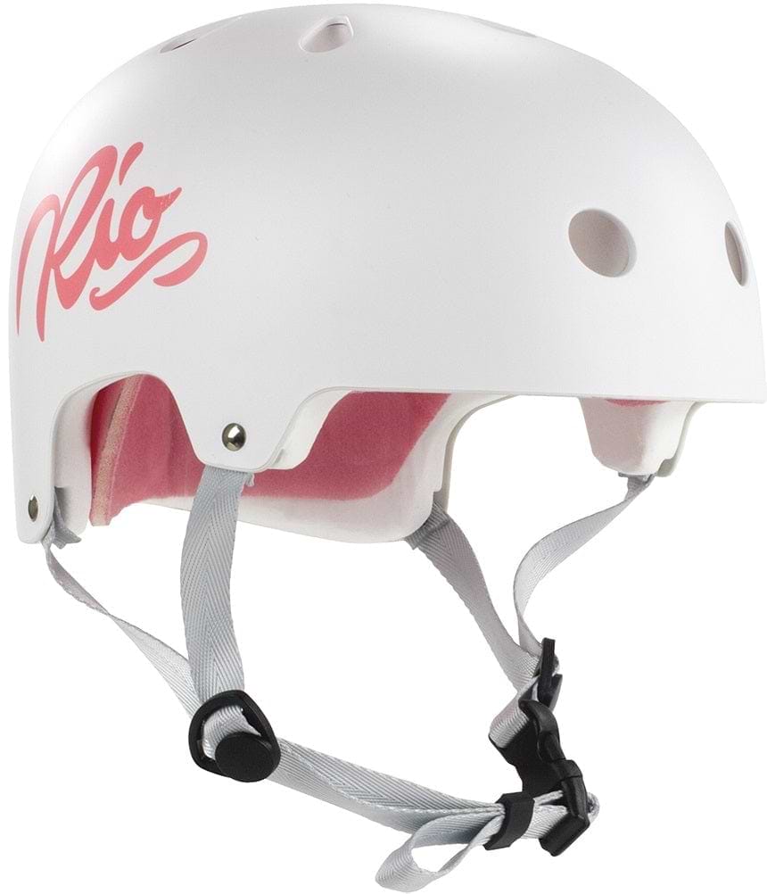 The Rio Roller Script Skate Helmet in white features a stylish retro design with pink interior padding and ventilation holes. Accented with "Rio" in pink script on the side, this helmet includes adjustable gray chin straps and a black buckle for improved impact resistance.