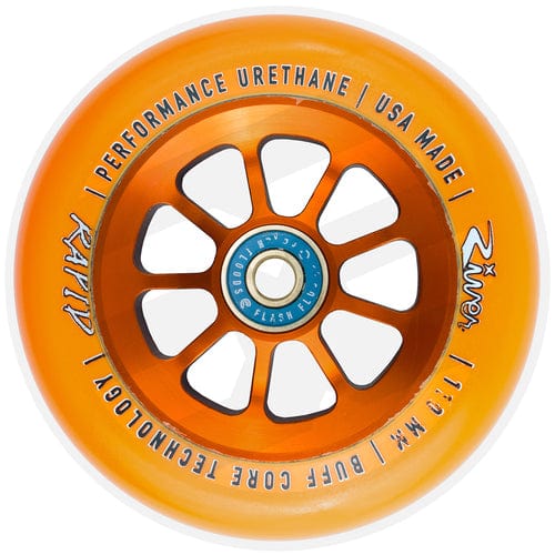 Close-up of the River Rapids 110mm Stunt Scooter Wheel in vibrant orange, featuring an intricate spoke design. The wheel is inscribed with “Performance Urethane,” “USA Made,” “Raptor,” and “BUFF Core Technology.” The blue central hub contains an anodized aluminum core.