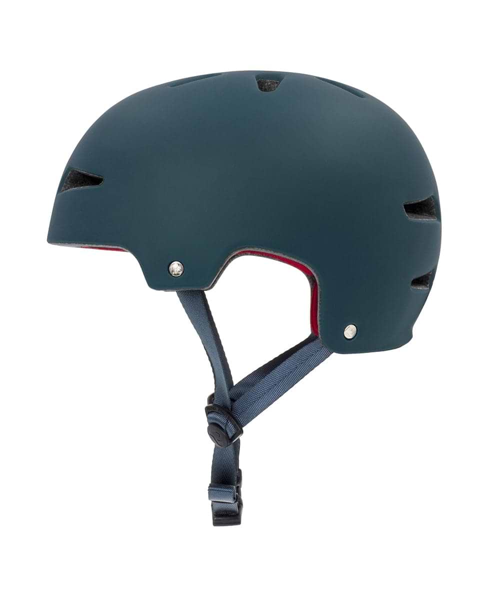 The REKD Ultralite In-Mold Skate / Scooter Helmet, ideal for action sports lovers, features a matte dark green finish with ventilation slots and a blue adjustable strap, all displayed in a side profile view.