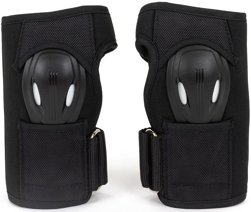 Introducing the REKD Pro Skate Protection Wrist Guards in Black: These wrist guards feature hard plastic protective shells and adjustable Velcro straps. With an ergonomic design that is perfect for extreme sports like skating, they promise safety and comfort against a crisp white background.