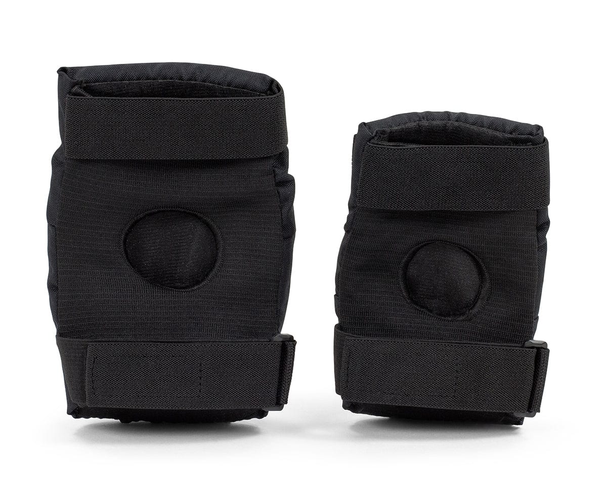 The REKD Youth Heavy Duty Double Skate Protection Pad Set in black is designed for ultimate protection and comfort during action sports like skating. These knee pads feature circular padding in the center and adjustable straps for a secure fit, ensuring safety while enjoying your favorite sports.