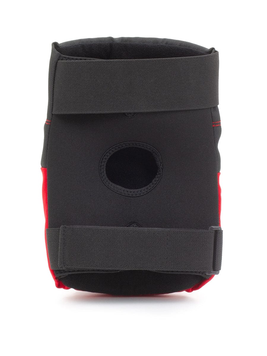 The REKD Ramp Knee Skate Protection Pads in Black/Red, with a round opening and dual straps, resemble the functionality of traditional knee braces. Crafted from soft and flexible materials for optimal comfort and support, these action sports knee pads by REKD are designed to stay securely in place during high-intensity activities.