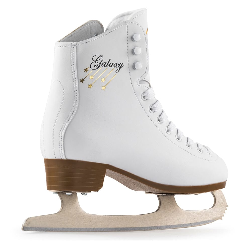 The SFR Galaxy 2 Figure Ice Skates in white, designed with an ergonomic heel and a wooden sole, are equipped with high carbon stainless steel blades. They feature the word "Galaxy" along with gold stars on the side, all set against a plain white backdrop.
