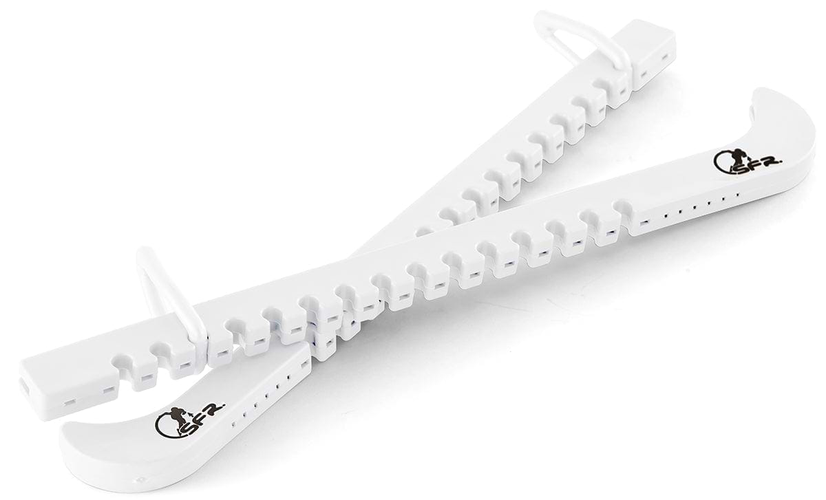 SFR Figure Ice Skate Blade Guards in white, crafted from durable polypropene, showcase a black SFR logo. Featuring grooves designed to fit ice skating blades and secure clasps at the ends, these guards elegantly cross over each other on a white background.