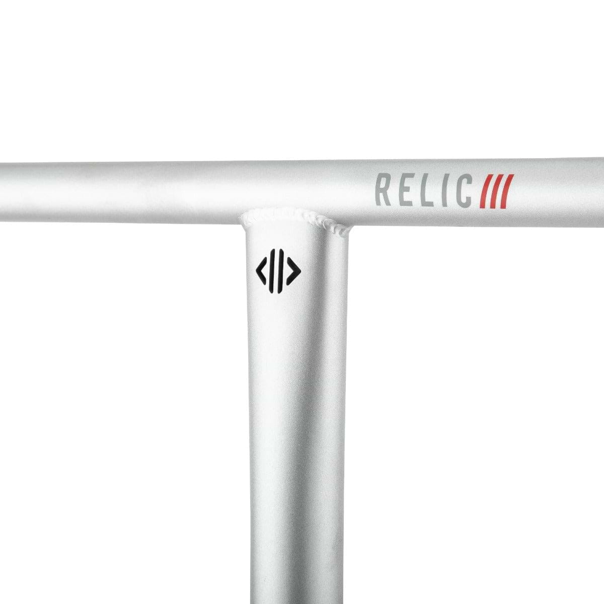 Close-up of the Drone Relic 3 Steel Oversized SCS Stunt Scooter Bars crafted from Chromoly 4130 steel in silver, featuring the word "RELIC" and three red lines. Below, a black logo resembling stylized arrows is visible. These handlebars by Drone have a smooth, metallic finish.