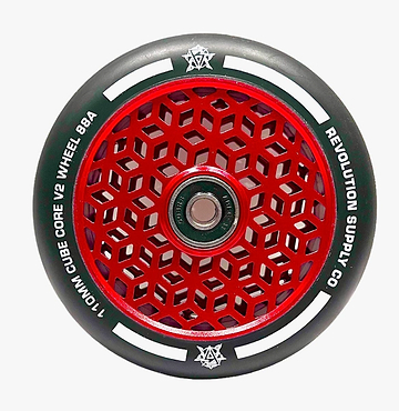 A close-up of a Revolution scooter wheel highlights the Cubed Core Ultralite design. The wheel displays a red geometric cube core surrounded by black rubber edges, with "Revolution Cubed Core Ultralite 110mm Stunt Scooter Wheel - Red" clearly visible around the perimeter.