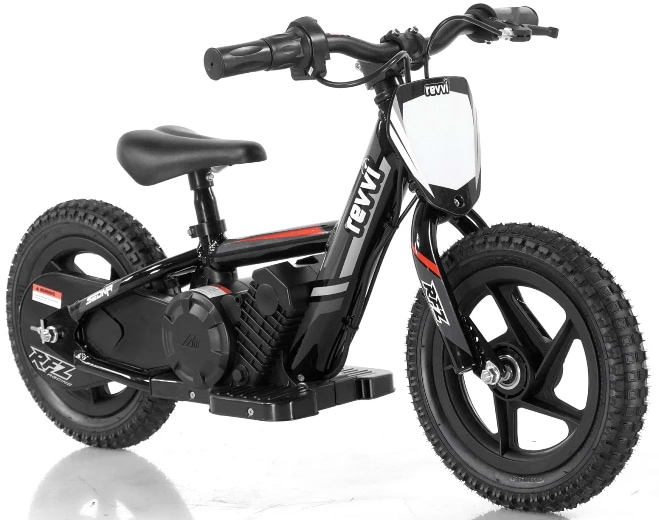 Designed for young riders, the Revvi 12" Kids Electric Balance Bike in black offers an exhilarating experience with its padded seat and twist throttle. It proudly displays Revvi's branding and features robust two wheels with white-lettered tires along with a sleek motor. The bike is equipped with front and rear fenders to ensure a smooth ride every time.