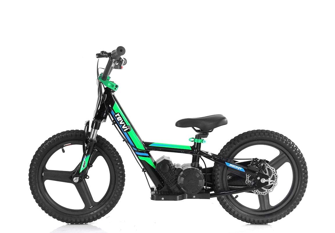 The Revvi 16" Plus Kids Electric Balance Bike - Green is displayed against a white background, featuring a striking black and green color scheme adorned with bold graphics. It comes equipped with hybrid rubber air-filled tires and large, three-spoke wheels, making it an ideal electric-powered motor bike for adventurous kids.