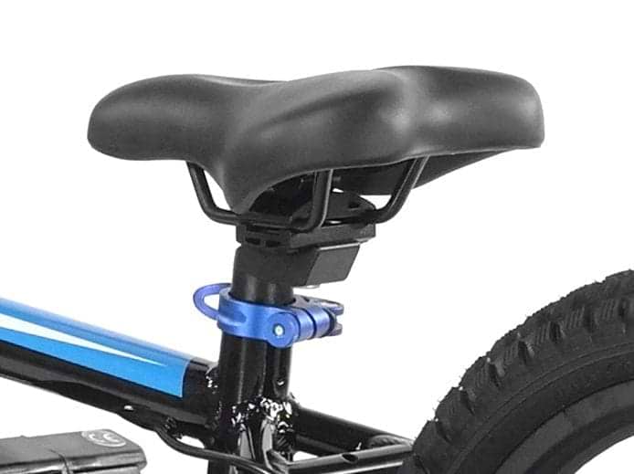 Close-up of a black bicycle seat with a blue adjustment clamp, part of the Revvi 16" Plus Kids Electric Balance Bike - Orange. The blue and black frame and rear tire can be seen in the background, with the image focusing on the seat and its mounting components.