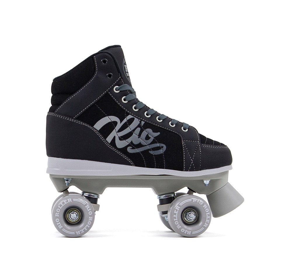 Displayed against a white backdrop is the Rio Roller Lumina Quad Roller Skate in black and grey, featuring white wheels. This skate, by Rio Roller, includes a high-top PVC leather boot with laces, nylon trucks, and showcases a prominent logo on the side.