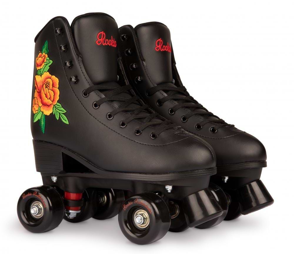 The Rookie Rosa Quad Roller Skates - Black feature striking black wheels and bold yellow and orange floral embroidery. Highlighted with the "Rookie" branding in red, these skates are vegan-friendly and come with a padded fleece lining to ensure maximum comfort.